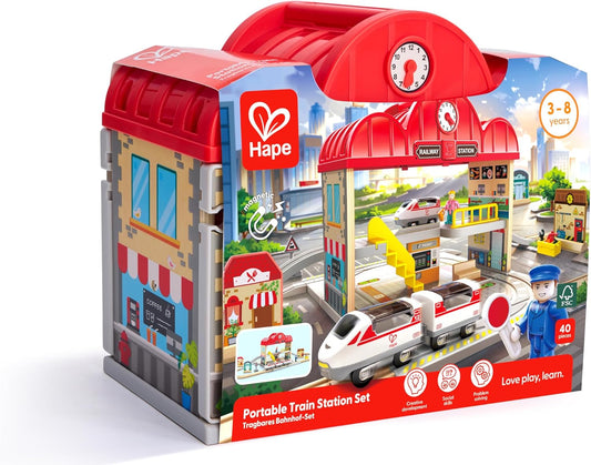 Hape Portable Train Station Set packaging with toy train and station model