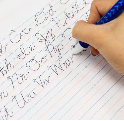 Cursive Writing Pad handwriten cursive on the writing pad